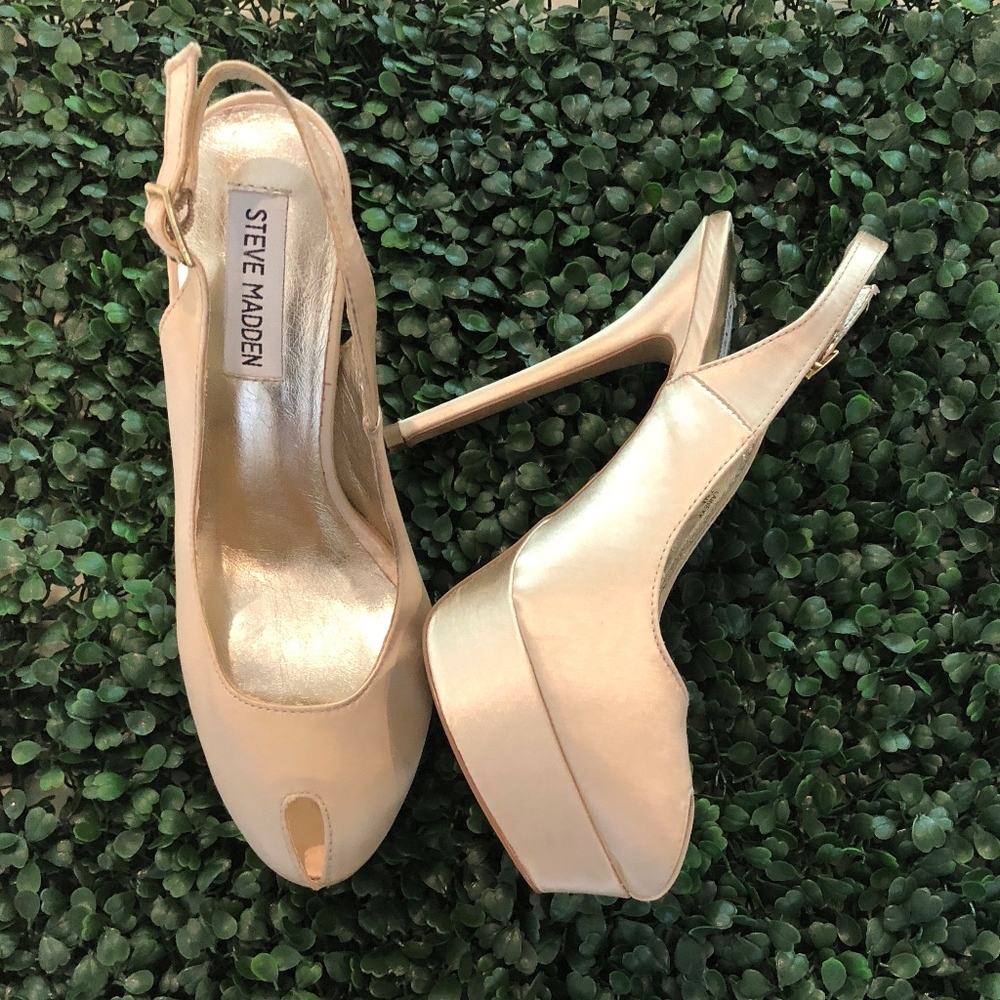 Never worn Steve Madden Champagne Platform heels